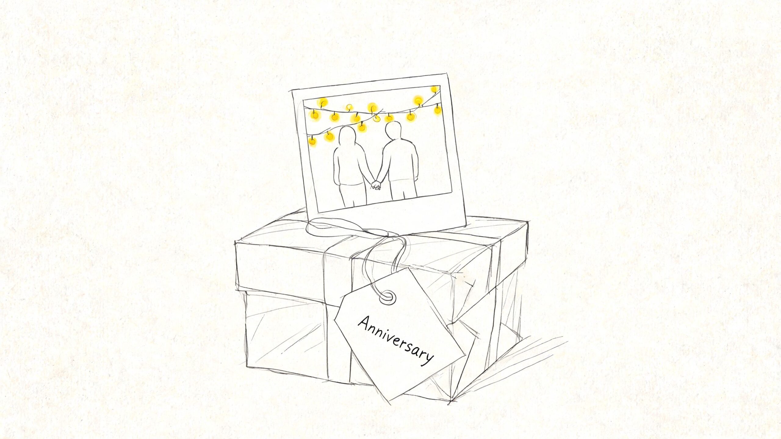 A hand-drawn sketch of a wrapped gift box topped with a polaroid photo showing a couple holding hands.